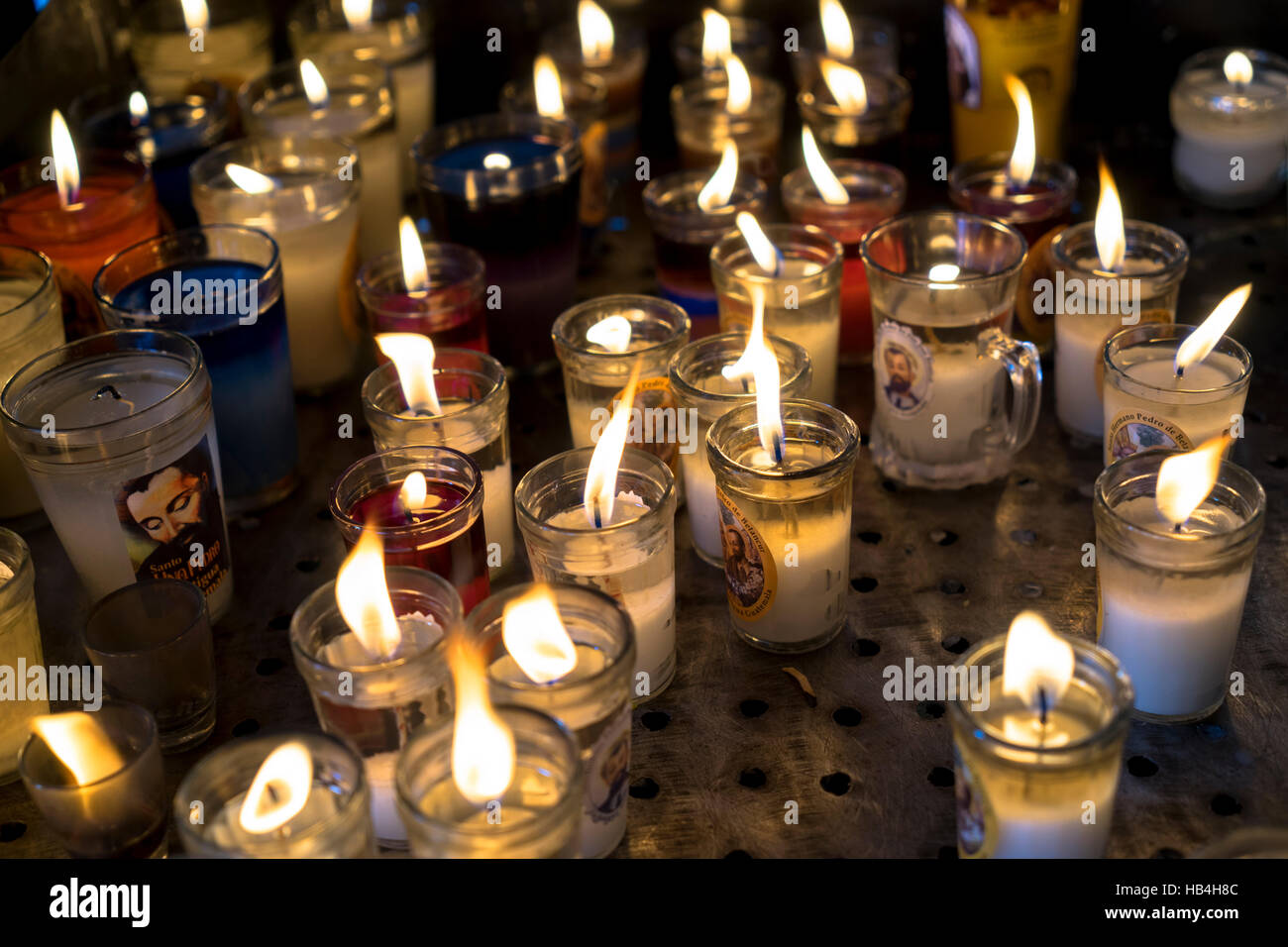 Votive candles lit closeup Stock Photo Alamy