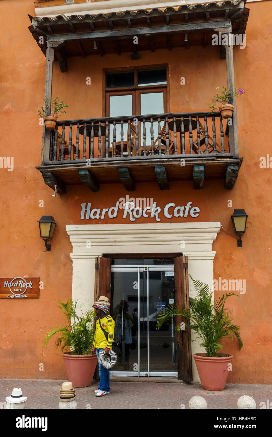 Man standing outside the entrance to the Hard Rock Cafe in the old city of Cartagena, Colombia Stock Photo
