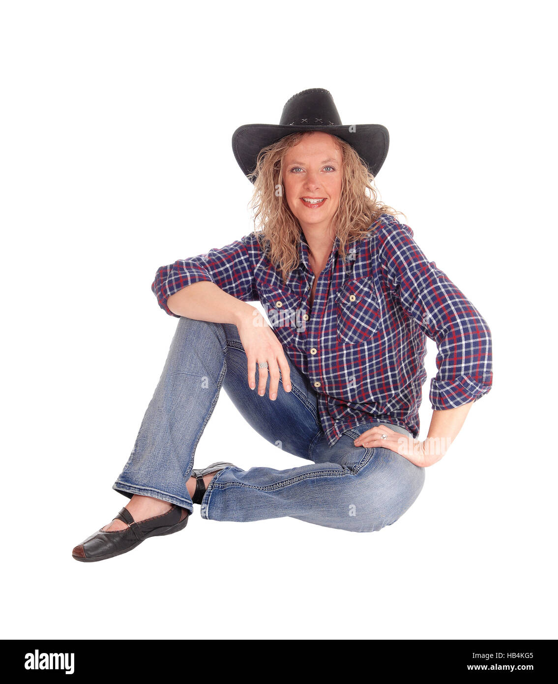 Lovely woman sitting on floor Stock Photo - Alamy