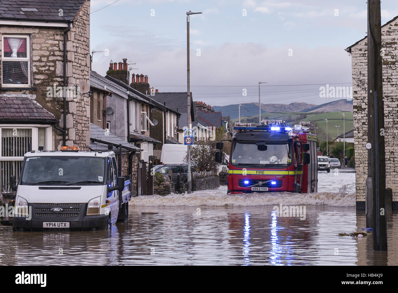 A fire engine battles through major flooding in Kendal, Cumbria on the 6th of December 2015. Stock Photo