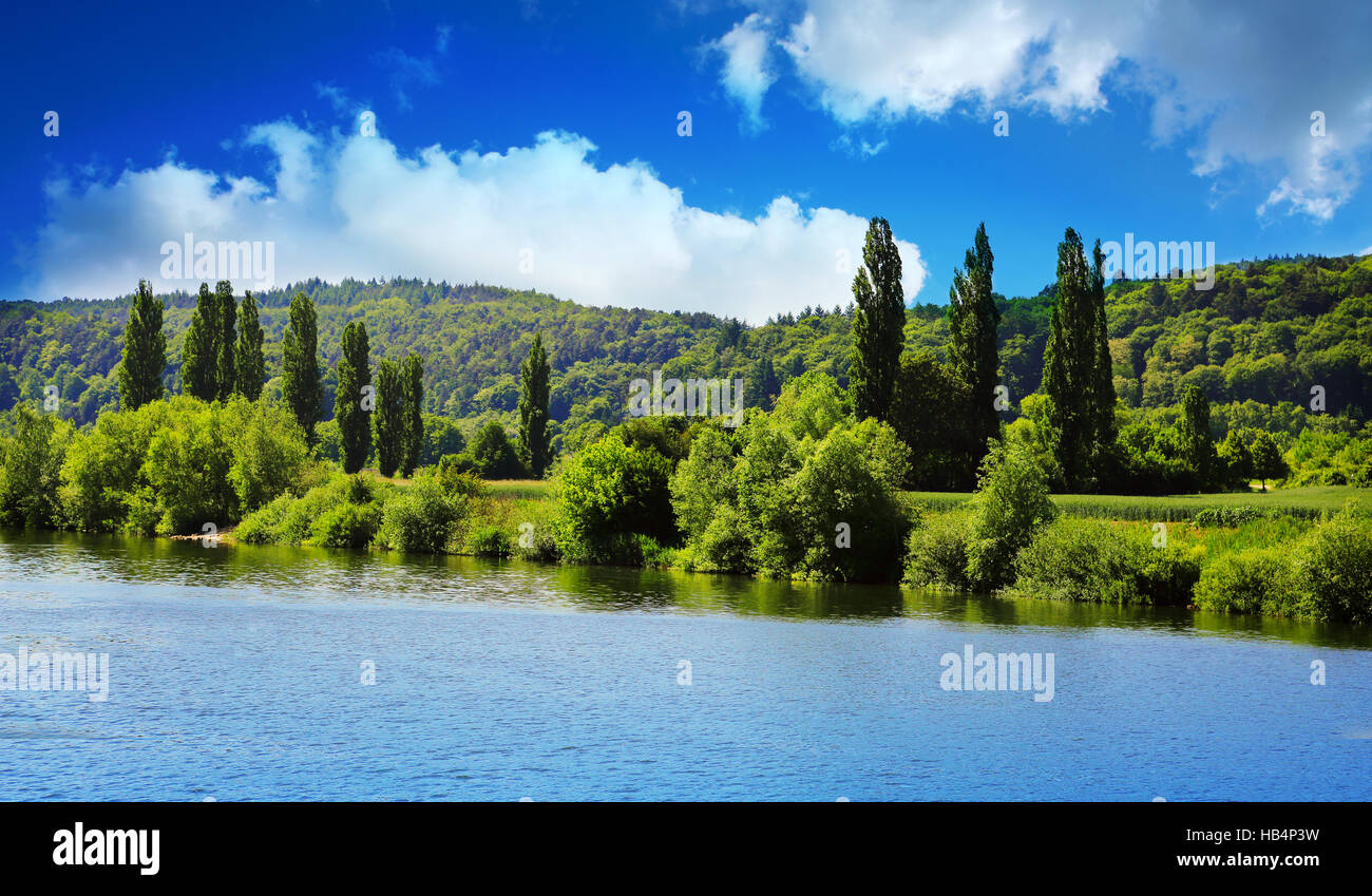 Silent lake under blue sky. Stock Photo