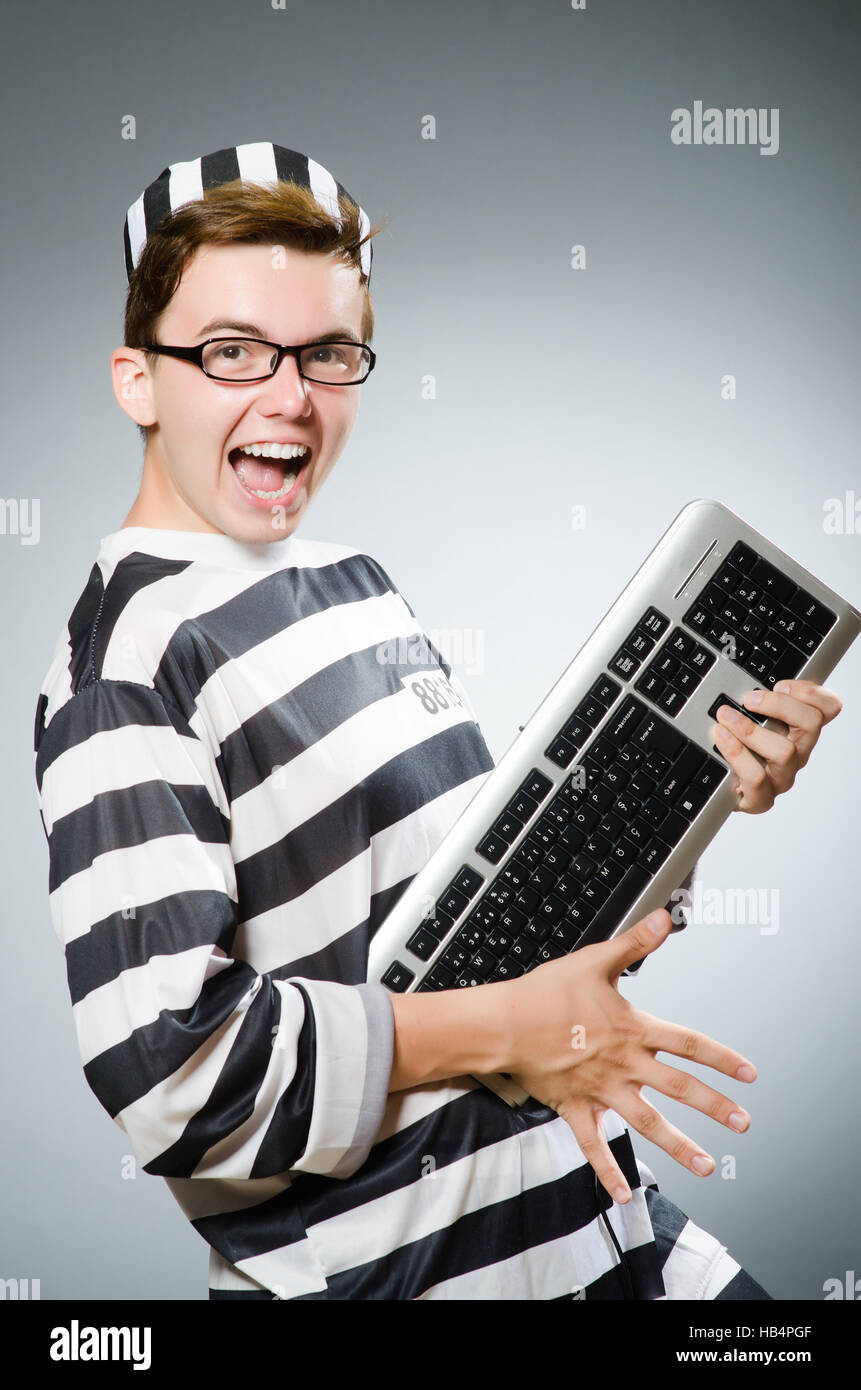 Funny prisoner in prison concept Stock Photo Alamy