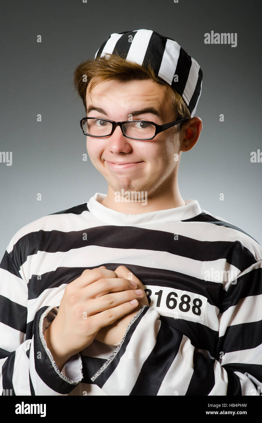 Funny prisoner in prison concept Stock Photo Alamy