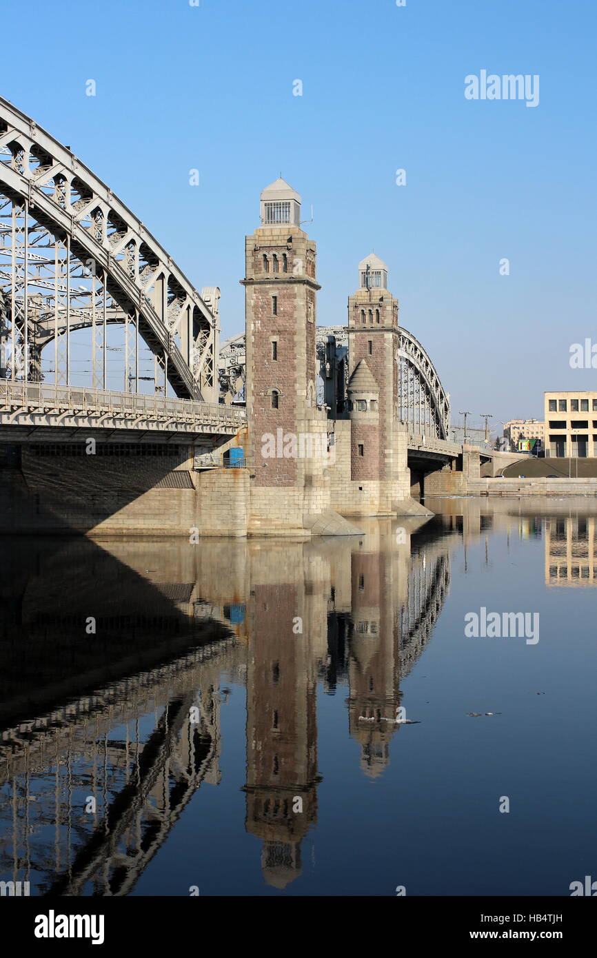 Old Bridge reflected in water Stock Photo