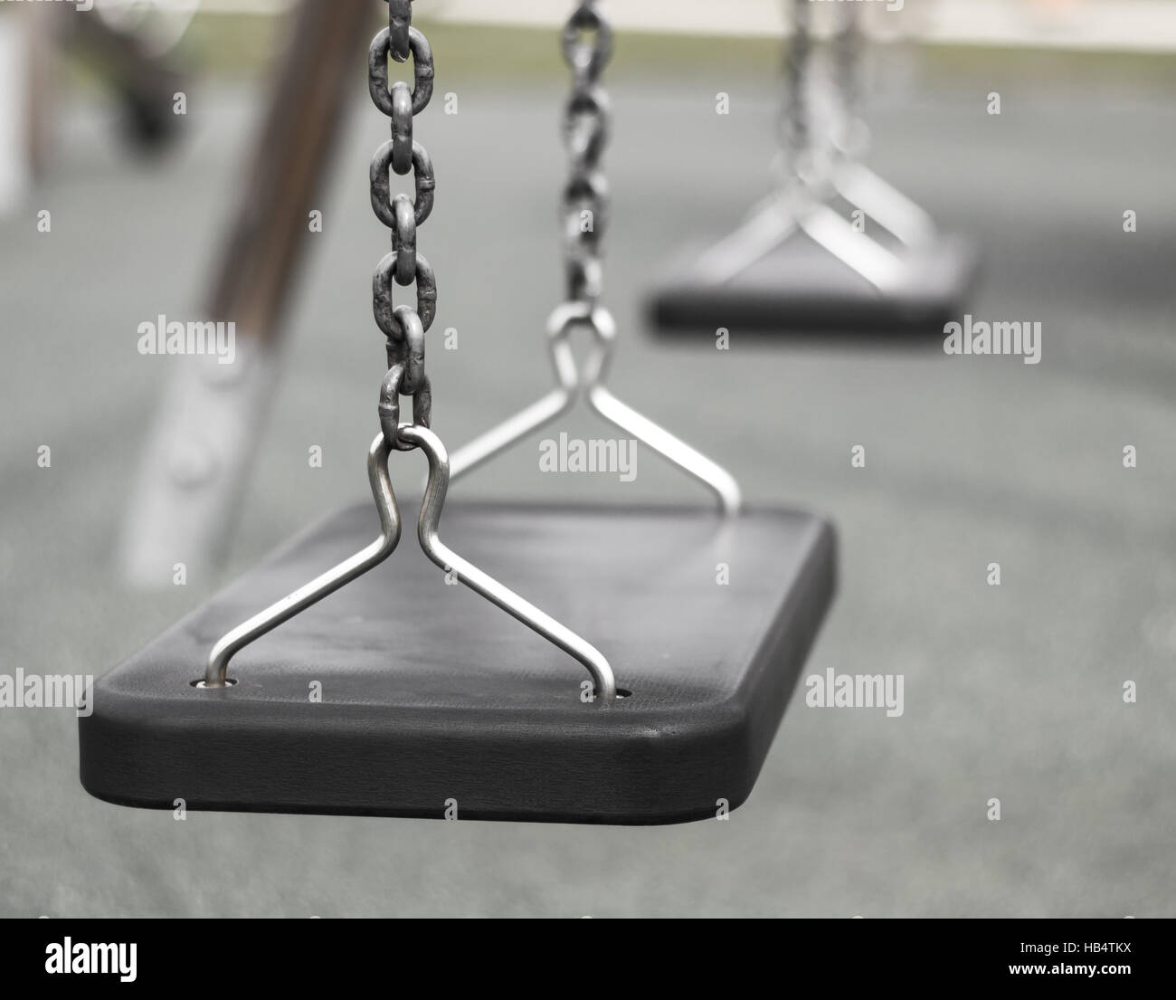 Swing in the playground Stock Photo