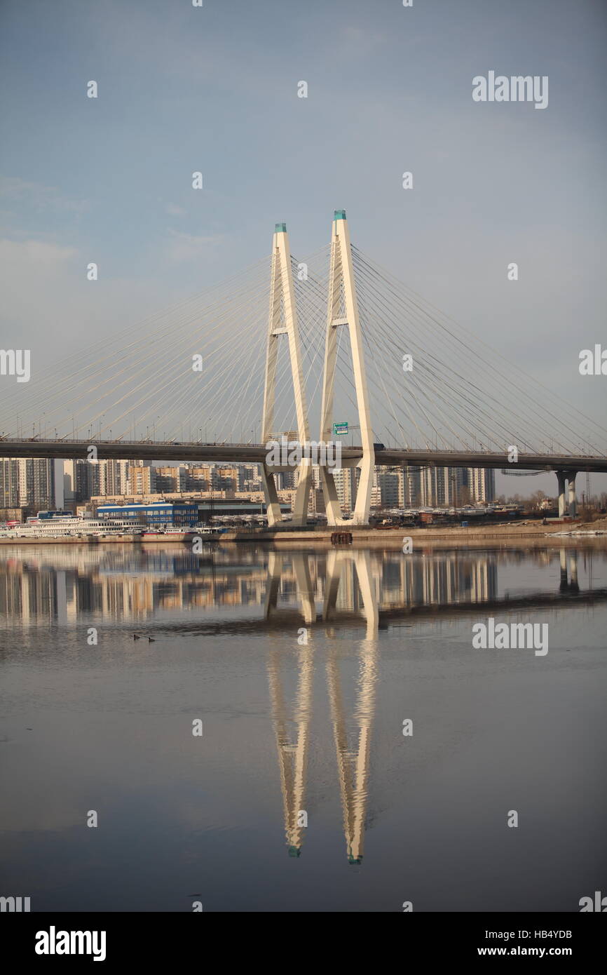 cable-stayed bridge reflected in the river Stock Photo