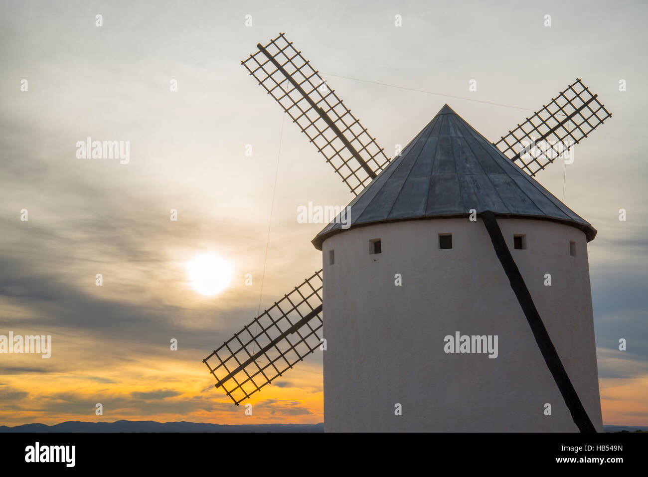 Windmill at sunset. Campo de Criptana, Ciudad Real province, Castilla La Mancha, Spain. Stock Photo