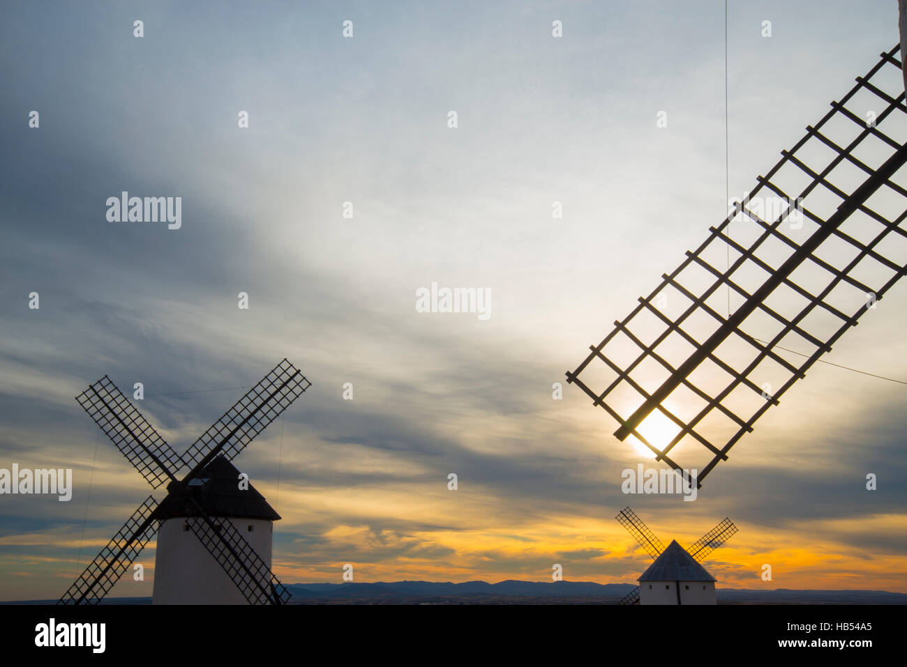 Windmills at sunset. Campo de Criptana, Ciudad Real province, Castilla La Mancha, Spain. Stock Photo