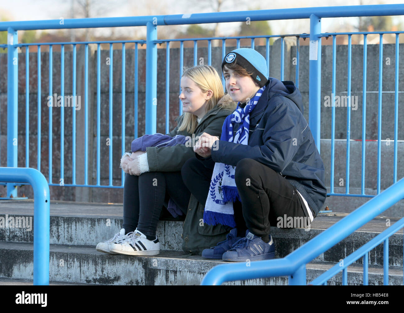 Fans look on before the Emirates FA Cup match at the Tameside Stadium, Ashton-under-Lyne. Stock Photo