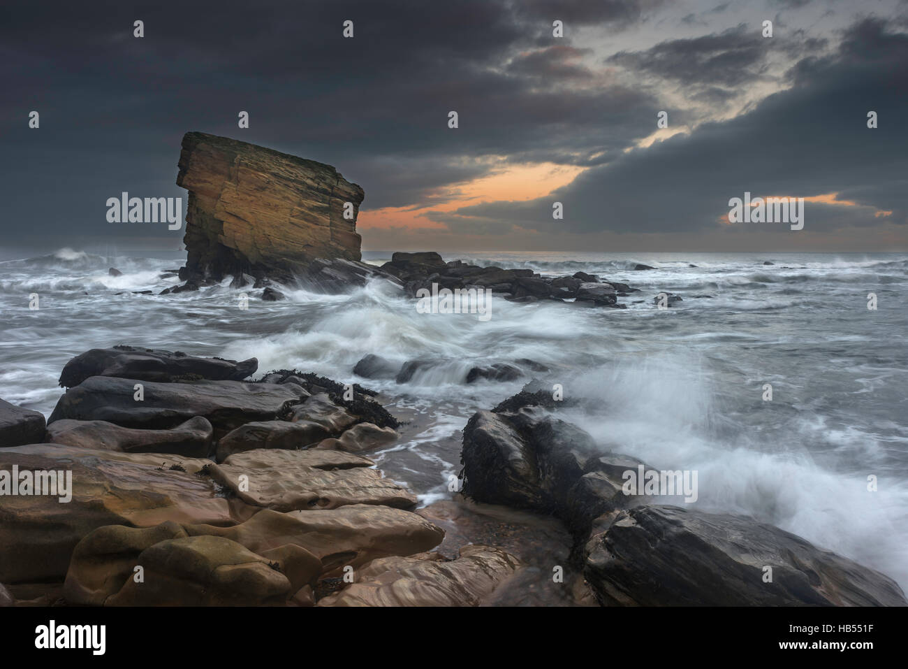 Big rock, Stormy Waters at Collywell Bay Stock Photo