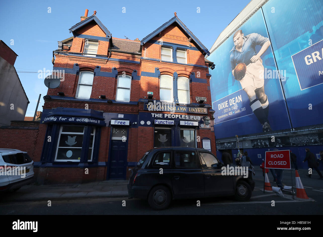 A general view of a Dixie Dean banner outside the ground next to a hotel before the Premier League match at Goodison Park, Liverpool. Stock Photo