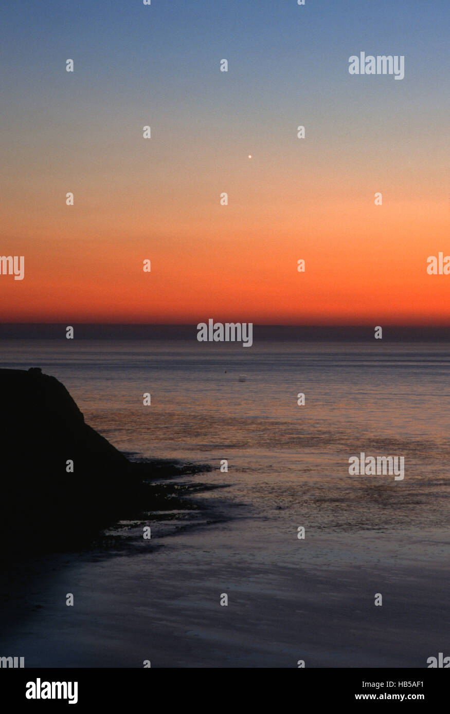 Sunset Over Ocean Stock Photo - Alamy