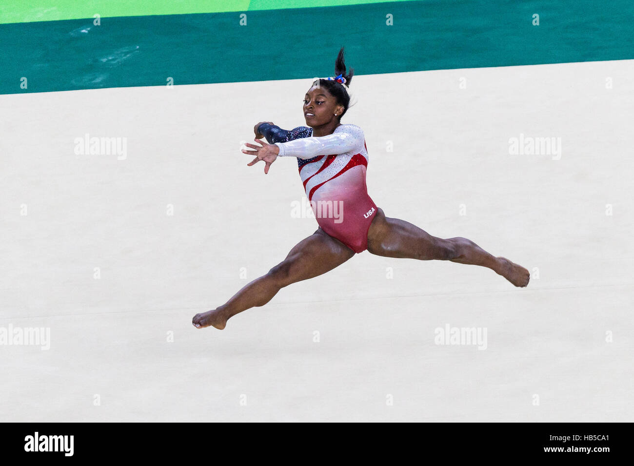 Rio de Janeiro, Brazil. 9 August 2016. Simone Biles (USA) performs the floor exercise as part of the Gold medal winning Women's Gymnastics Team  at th Stock Photo