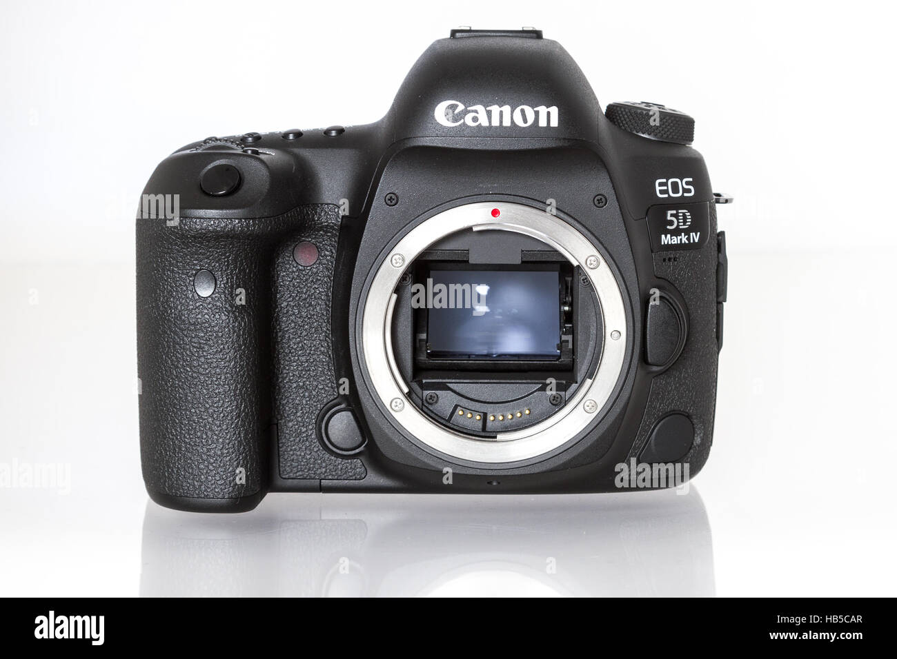 Canon 5D Mark IV. 30 mpx camera body on a white  background Stock Photo