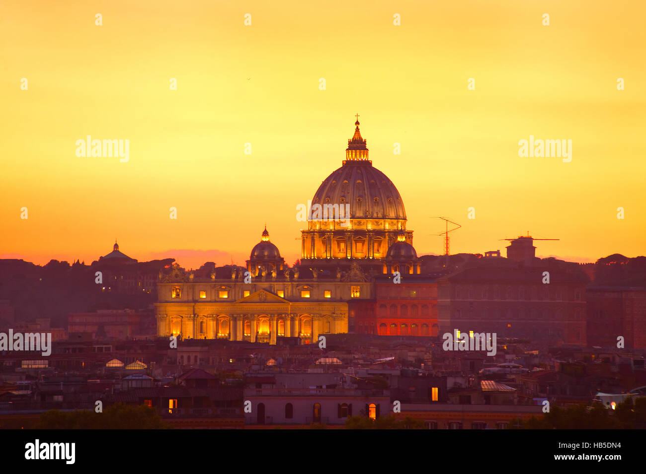 View of Rome at twilight with St Peter Cathedral. Italy Stock Photo