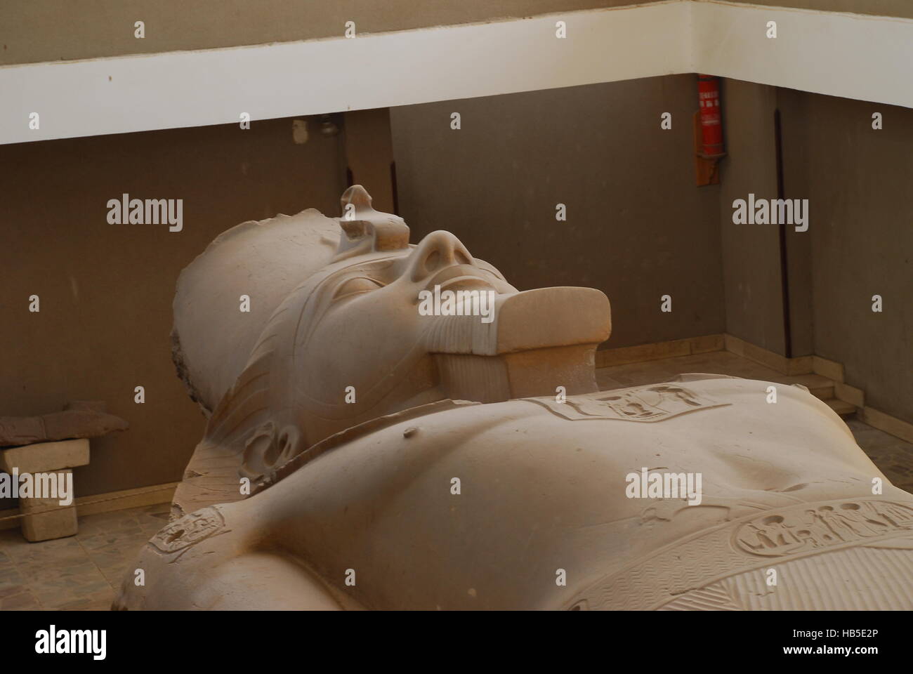 Head of the statue of king Ramses II Stock Photo - Alamy
