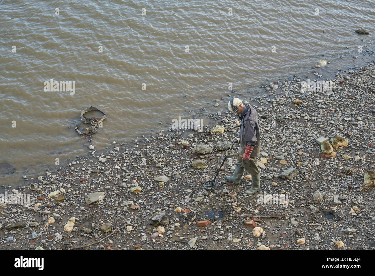 metal detectoring on river. Metal detector. Thames Mudlarking Stock