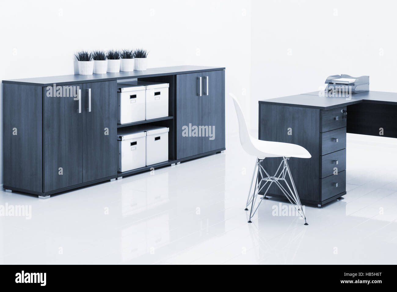 desk and chair with reflection Stock Photo - Alamy