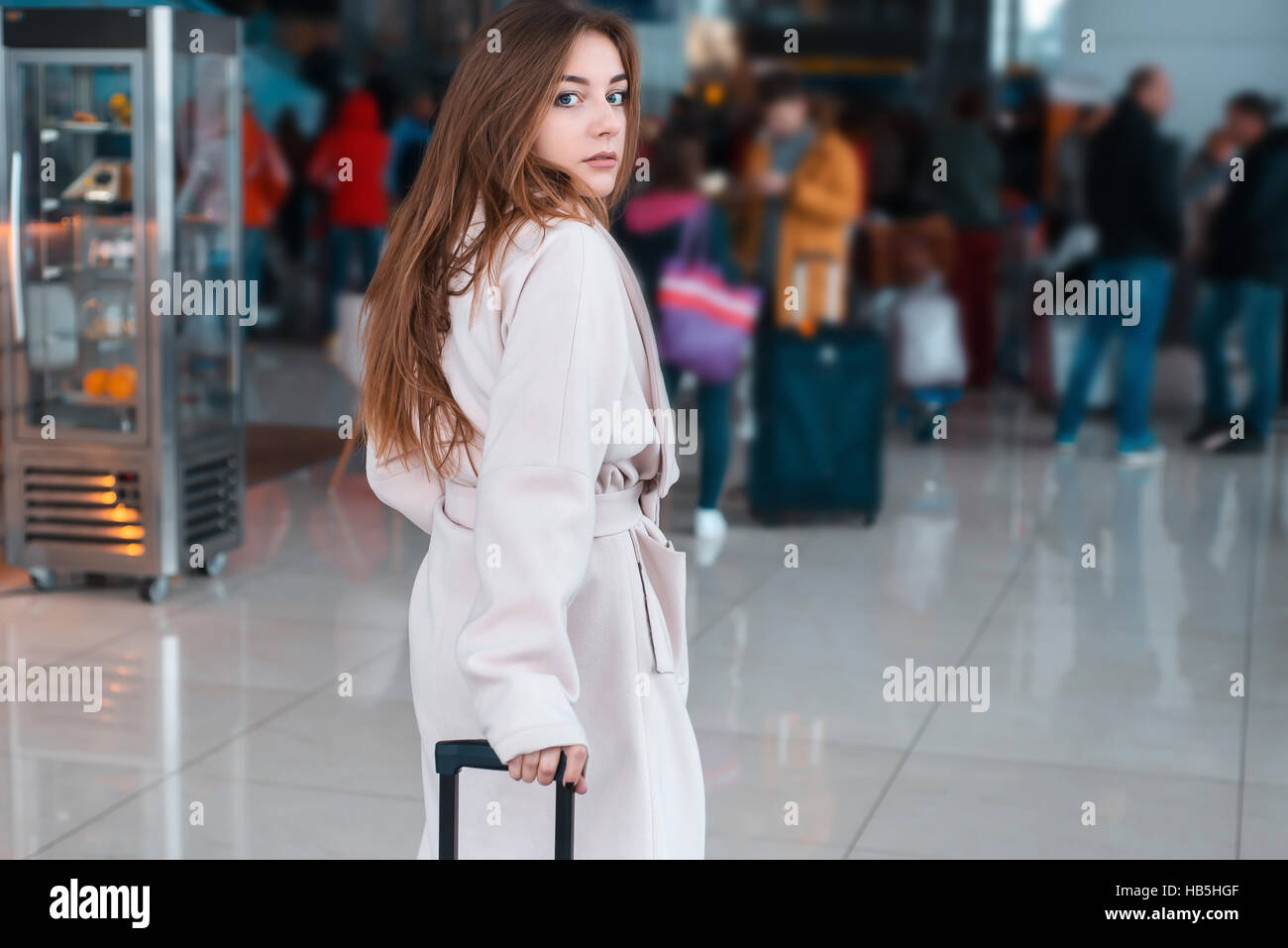 Young woman in the modern airport Stock Photo - Alamy