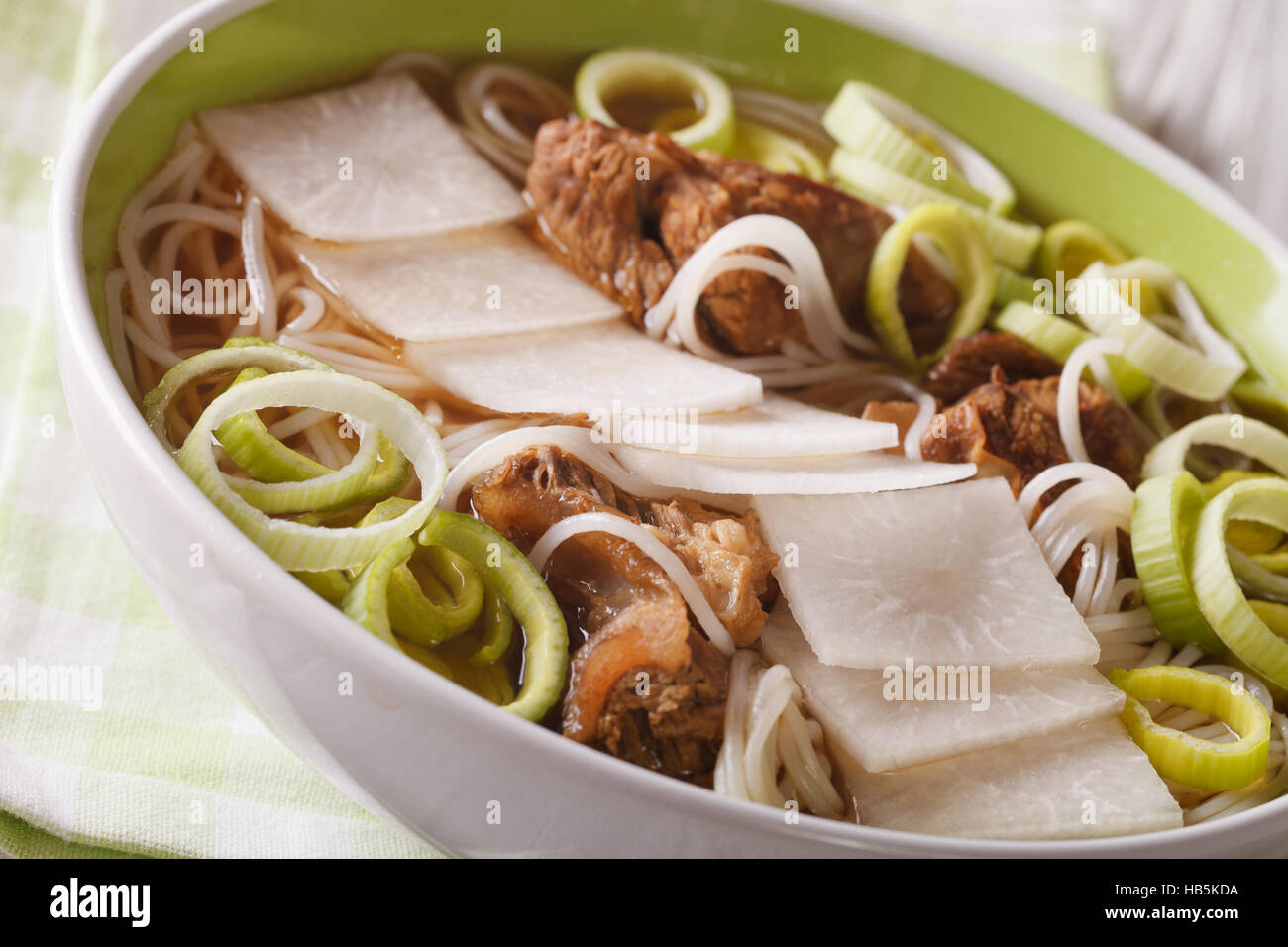 Korean beef ribs soup Galbitang close up in a bowl. horizontal, macro Stock Photo