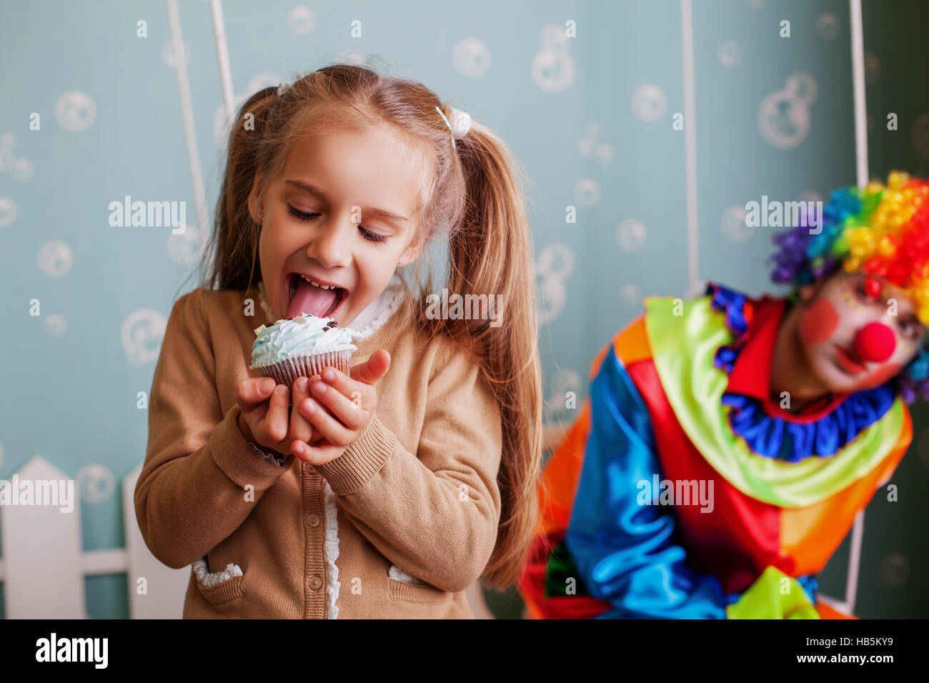 Children eating birthday cake hands hires stock photography and images