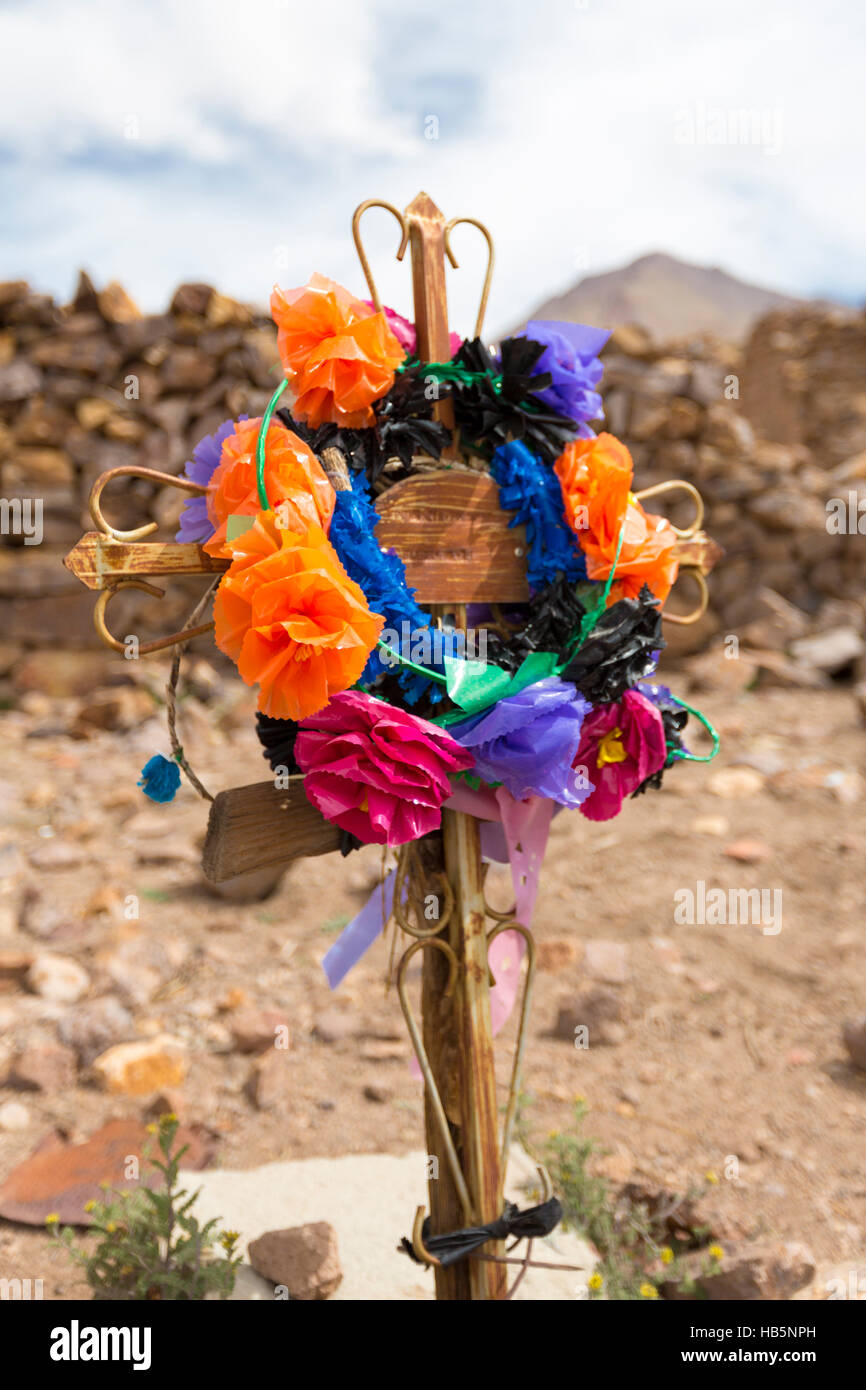 Wooden old christian religious cross at the Lipez ruins in Bolivia Stock Photo