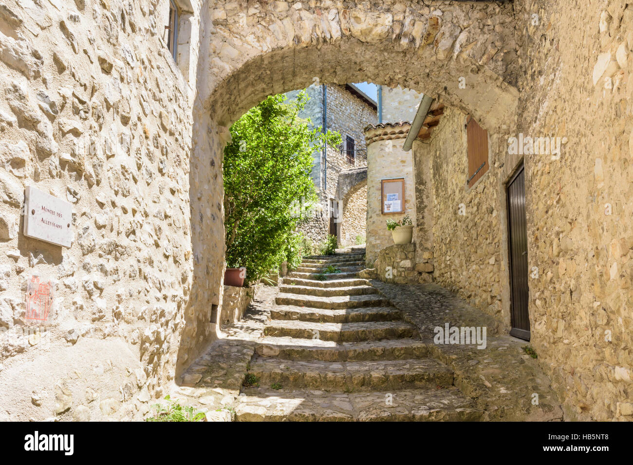 Reinforcing buttress arch in the medieval village of Mirmande, Drôme, France Stock Photo