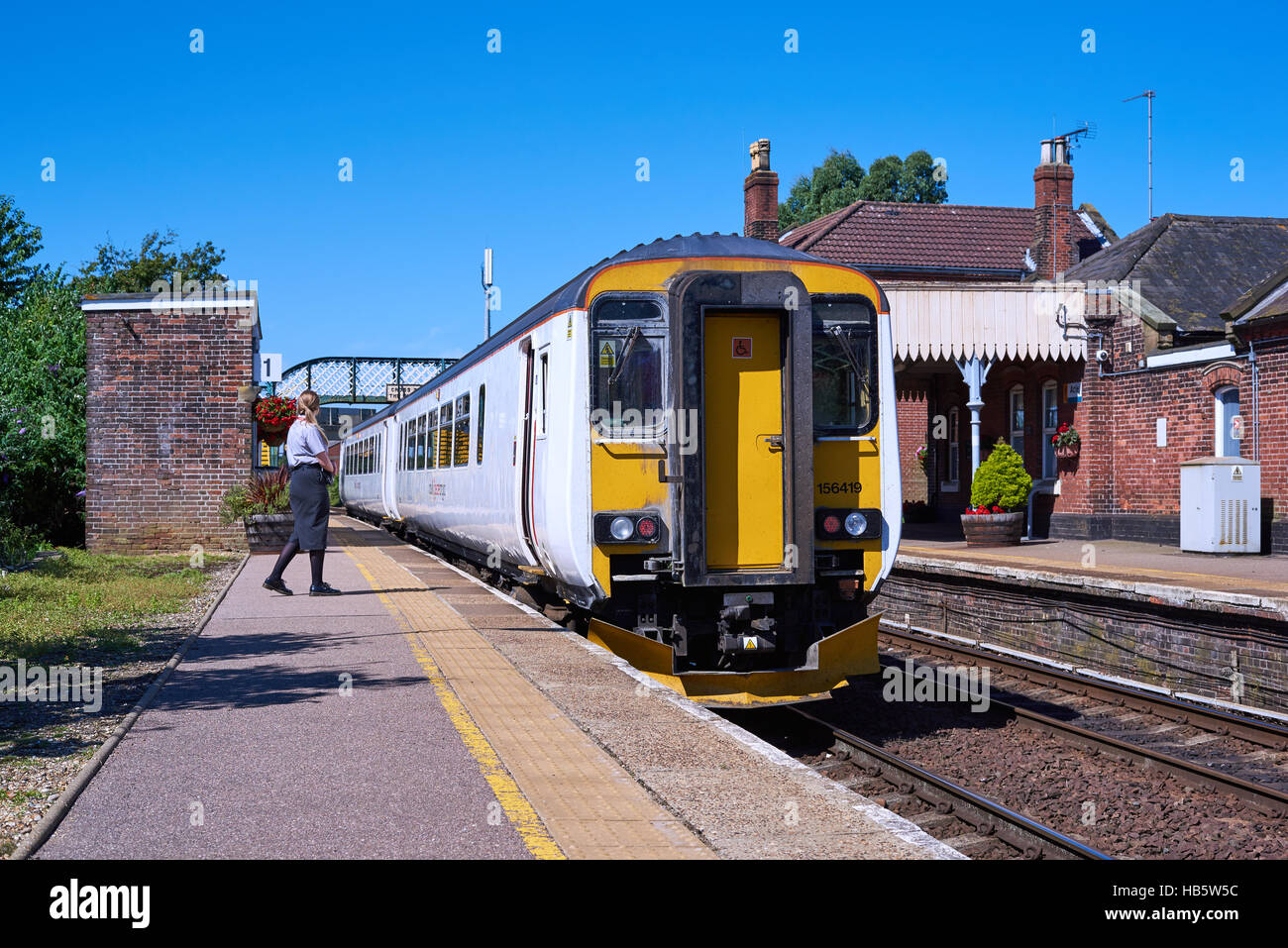 156419 stops at Acle with a Great Yarmouth - Norwich serice on 18th July 2016. Stock Photo