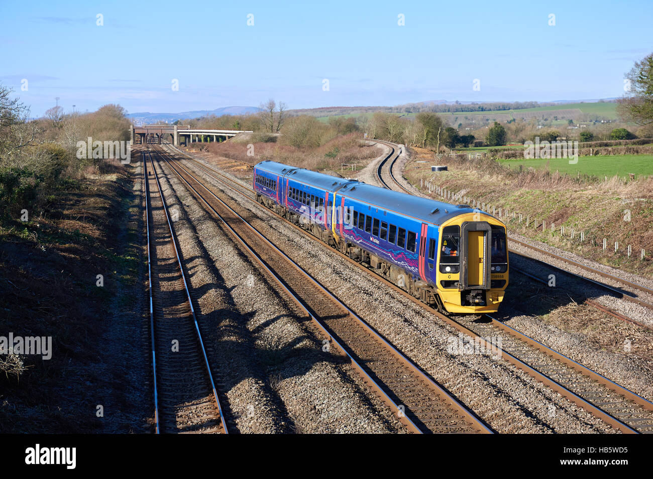 First Great Western 158958 passes through Bishton, South Wales with 1F11 1030 Cardiff Central to Portsmouth Harbour on  19th Feb 2016 Stock Photo