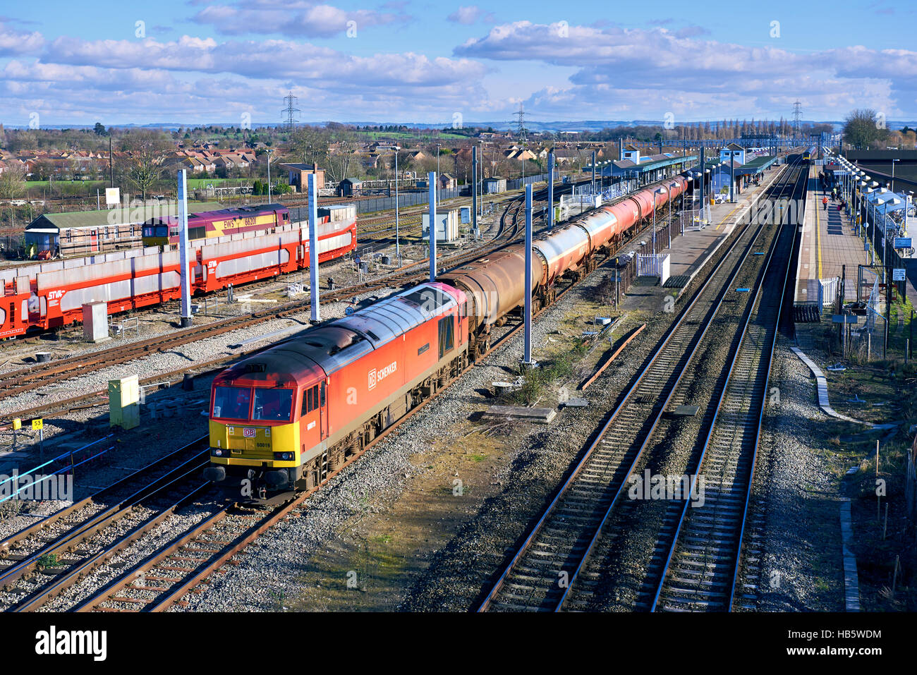 DBS 60019 power through Didcot Parkway with 6B33 Theale - Robeston Murco boggie tanks on 18th Feb 2016. Electricication here is at an advanced stage. Stock Photo