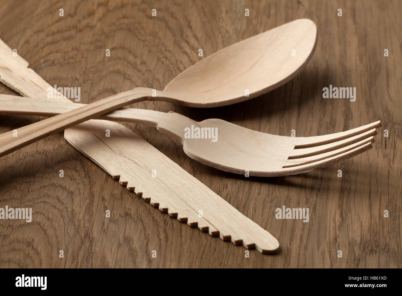 Disposable wooden fork, knife and spoon Stock Photo