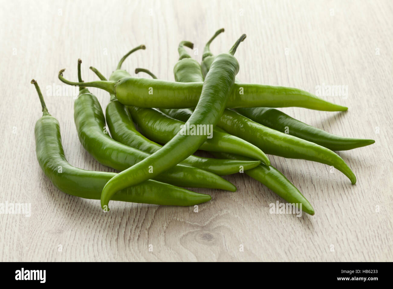Heap of fresh green chili peppers Stock Photo