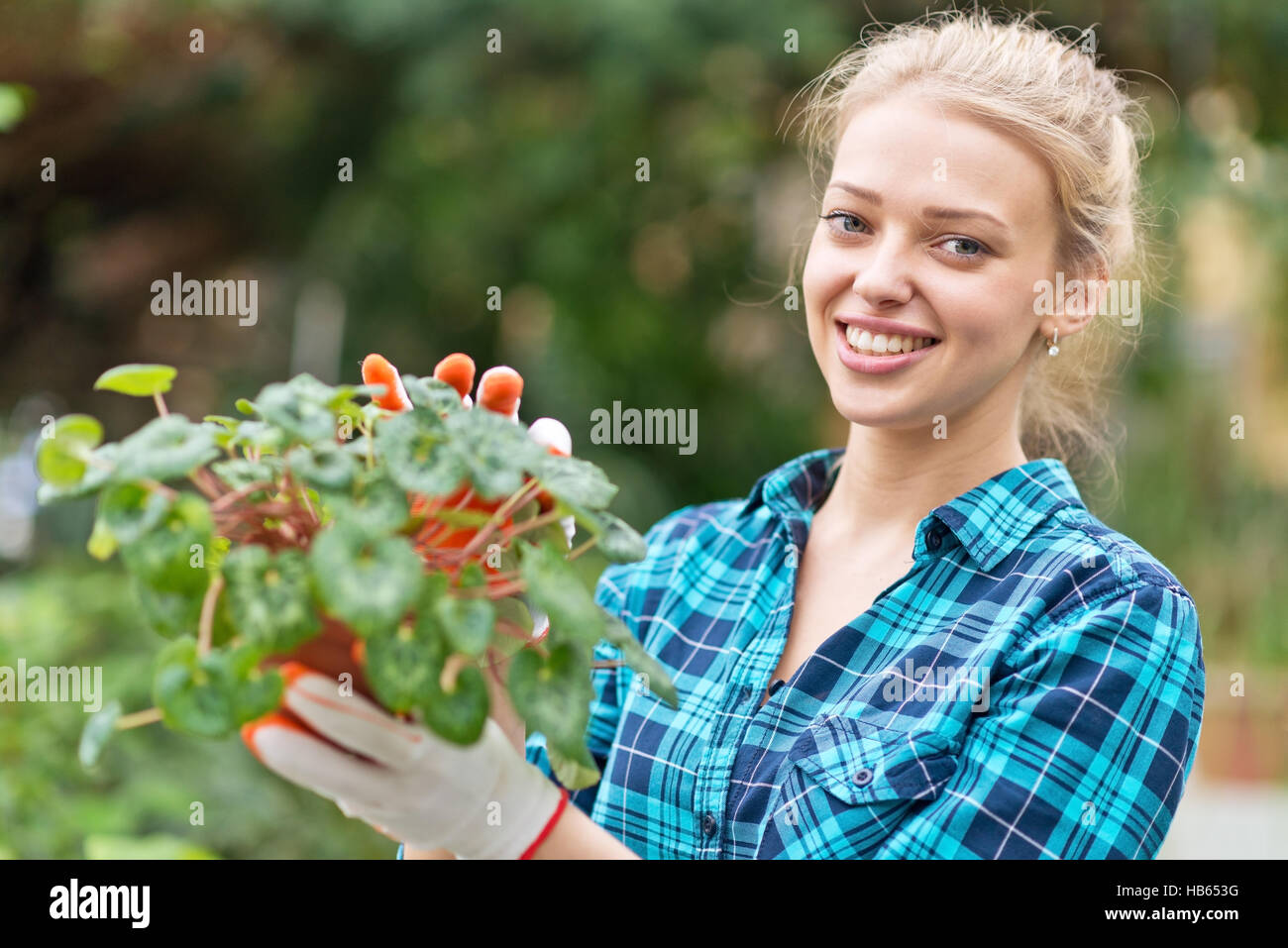 beautiful female florist Stock Photo Alamy