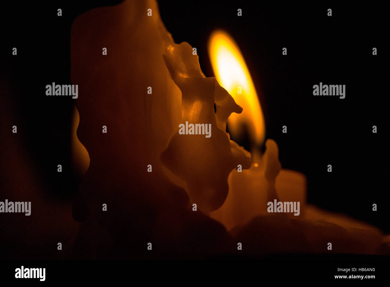 burning candle with wax Stock Photo Alamy