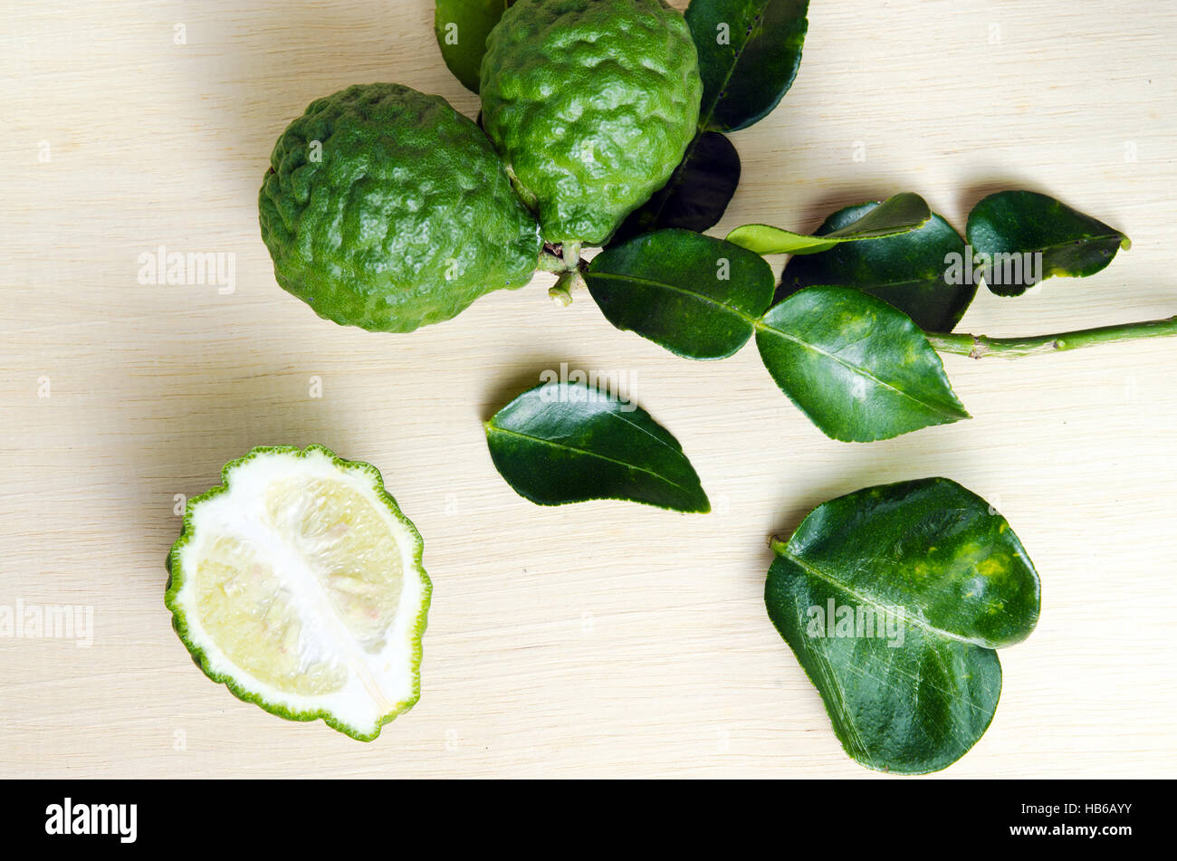 Bergamot (Also known as Kaffir lime, Citrus lime, Citrus bergamia, Citrus, Bergamot, Magnoliophyta Rutaceae) fruits with leaf Stock Photo