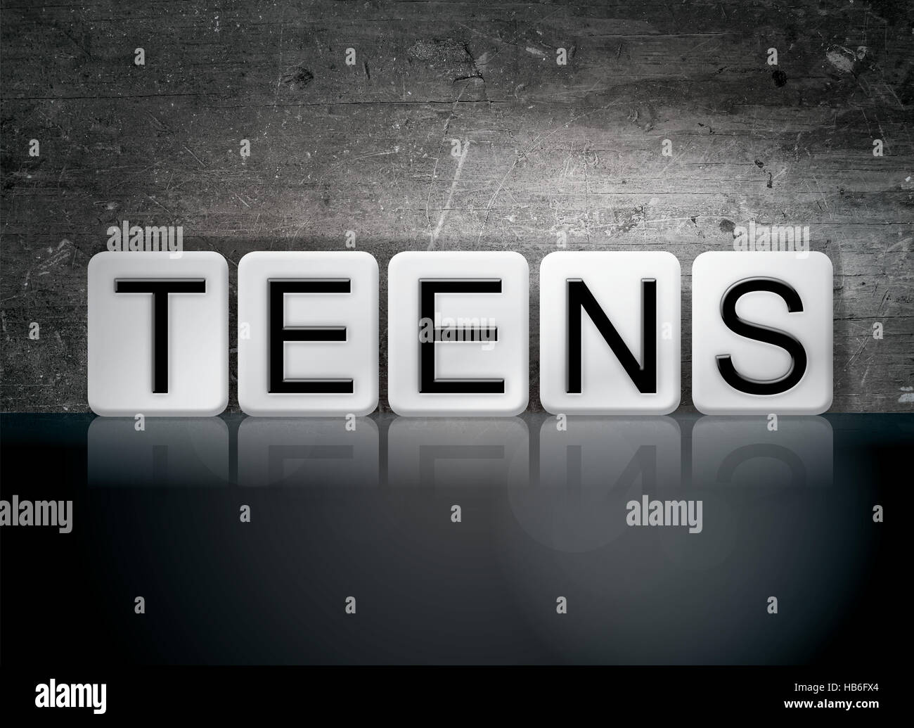The word "Teens" written in white tiles against a dark vintage grunge