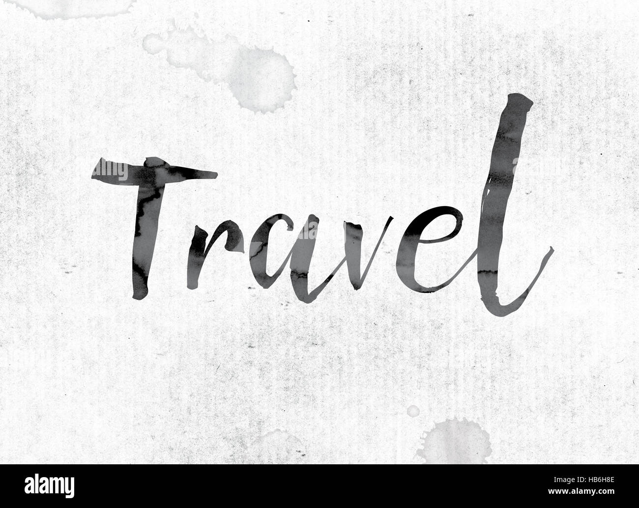 The word “Travel” concept and theme painted in watercolor ink on a