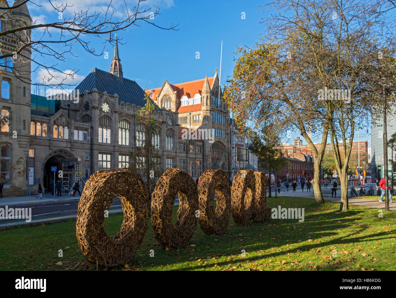'10,000 Actions' sign (an energy conservation programme) in wicker work, Manchester University, Oxford Road, Manchester, UK. Stock Photo