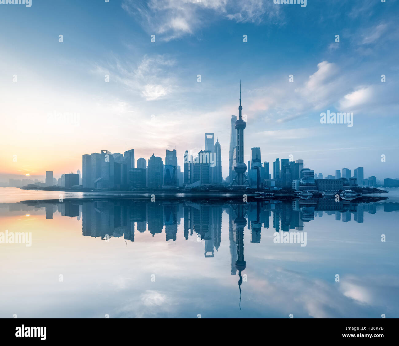 shanghai skyline with reflection in sunrise Stock Photo