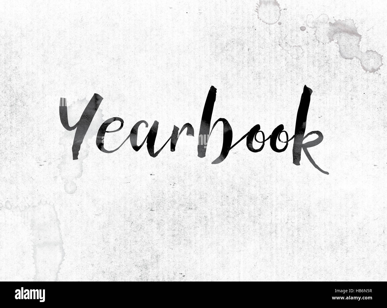 The word "Yearbook" concept and theme painted in watercolor ink on a