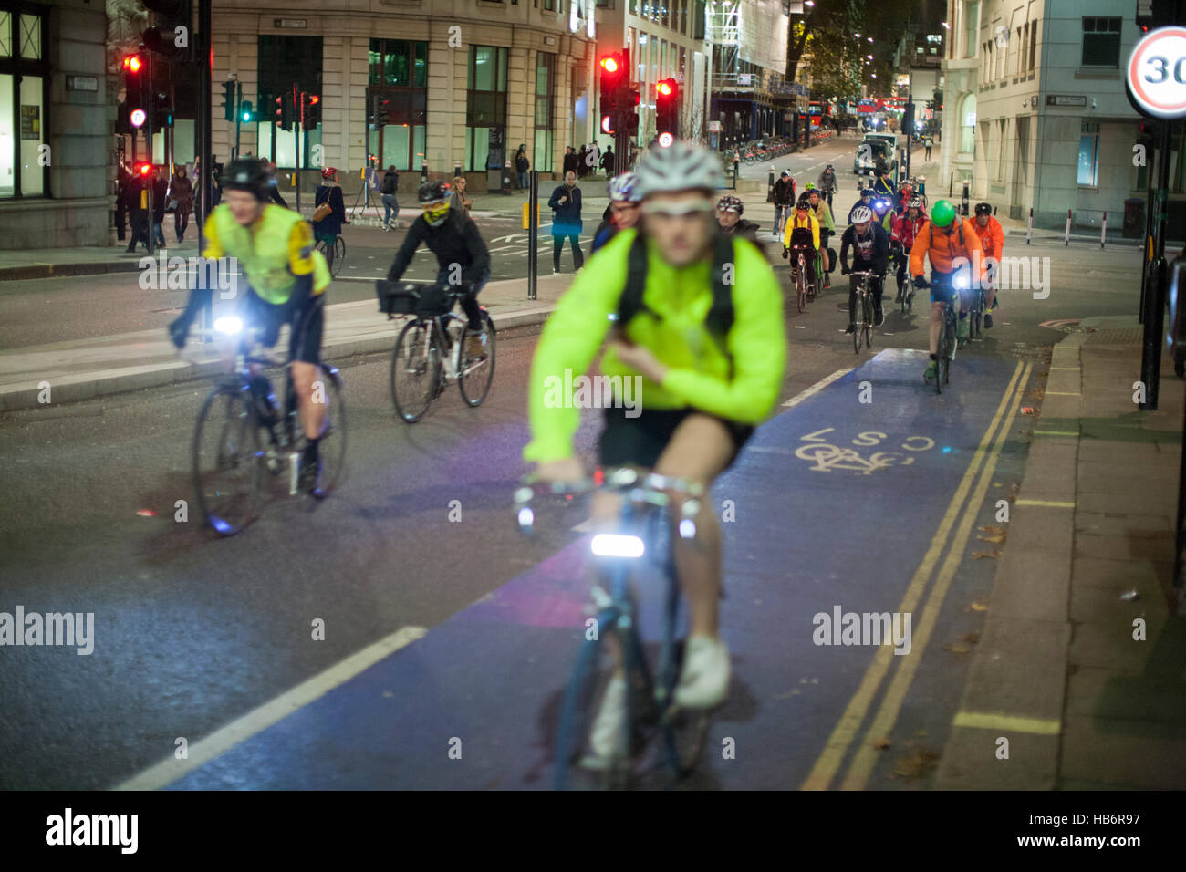 cyclists crossing Southwark Bridge on London cycle superhighway Stock Photo