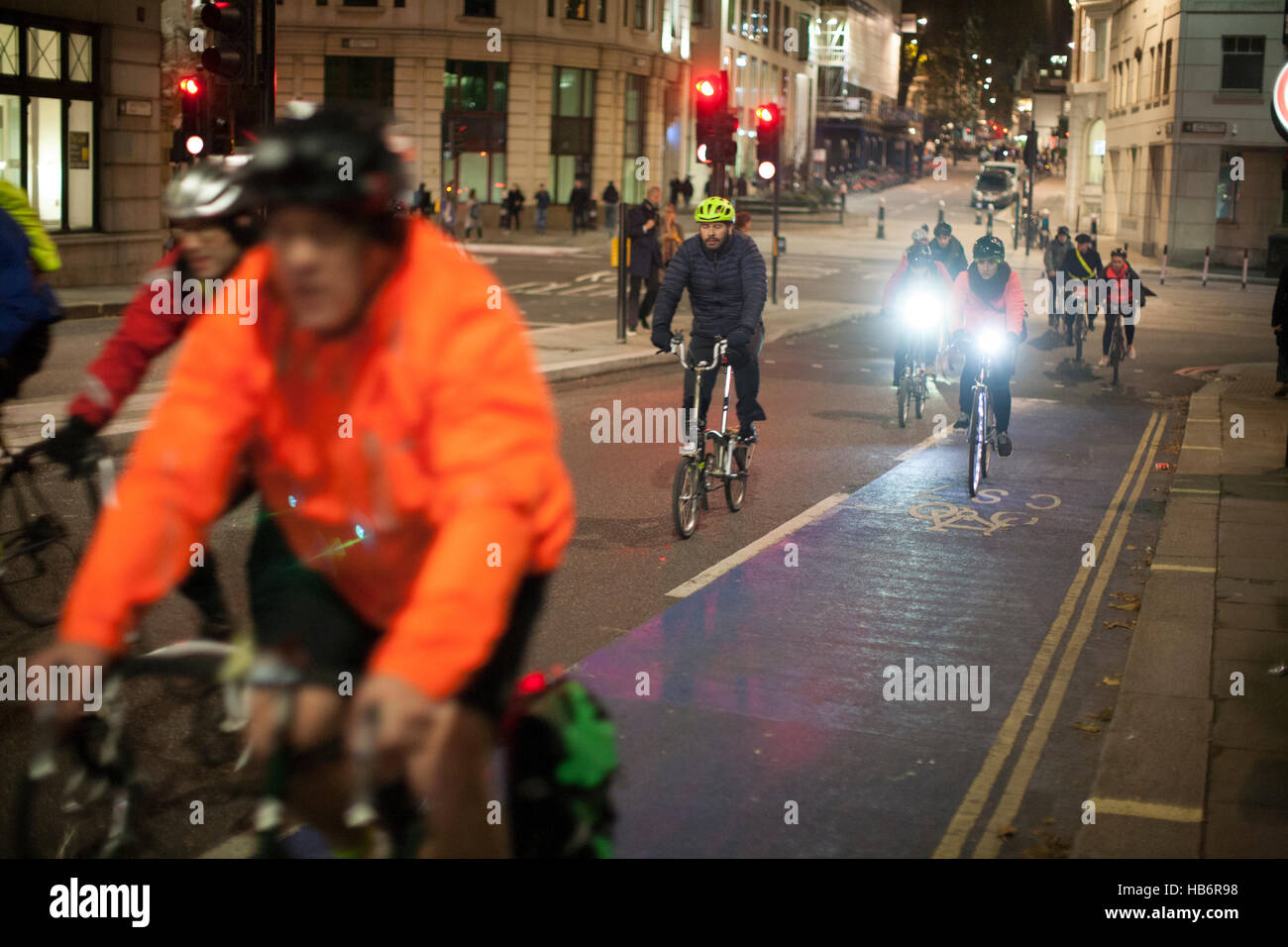 cyclists crossing Southwark Bridge on London cycle superhighway Stock Photo