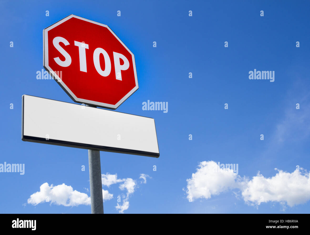 Stop sign with cartel blank Stock Photo