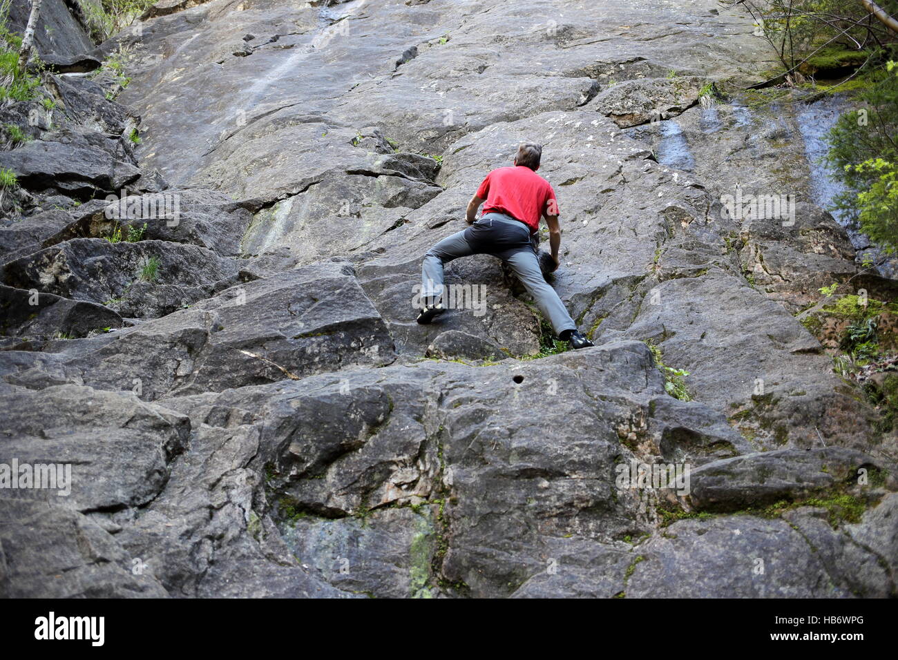 man is bouldering Stock Photo