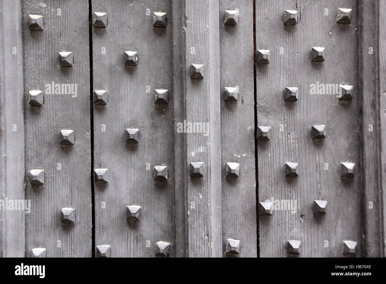 Grey wooden background with spikes Stock Photo - Alamy