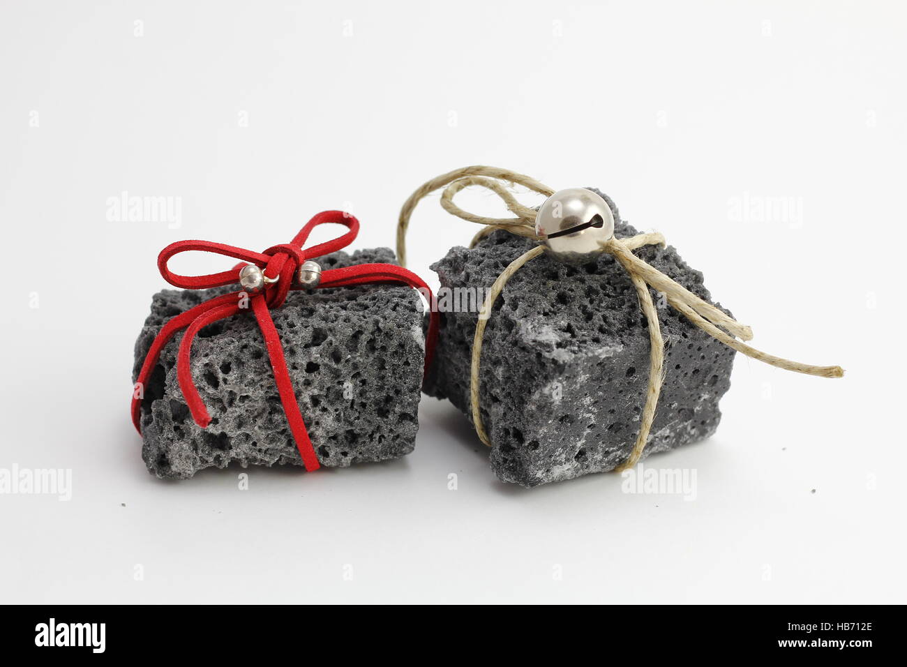 Christmas coal with ribbons, sweet gift for naughty boys Stock Photo