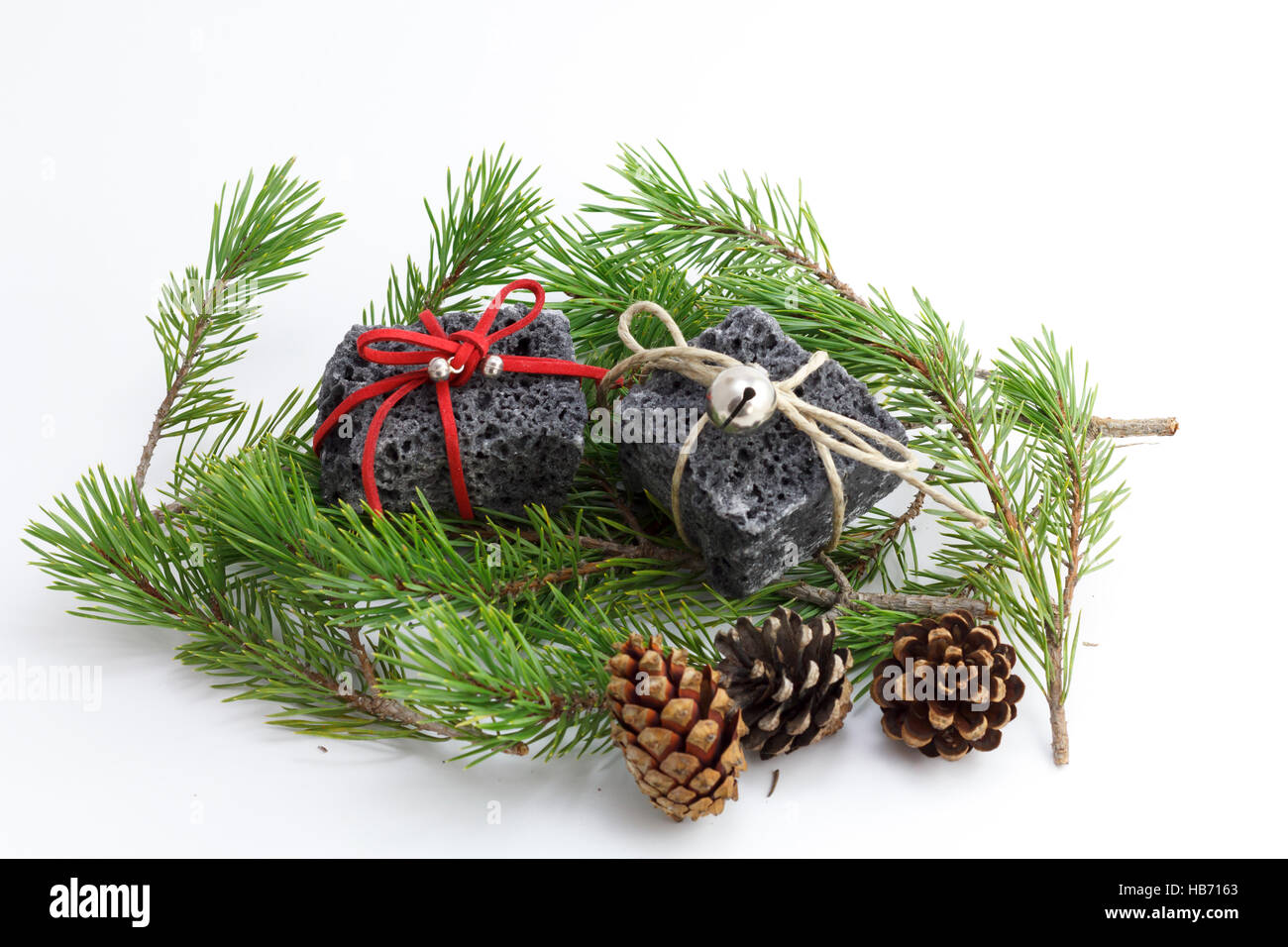 Christmas coal and pine tree leaves, sweet gift for naughty boys Stock Photo