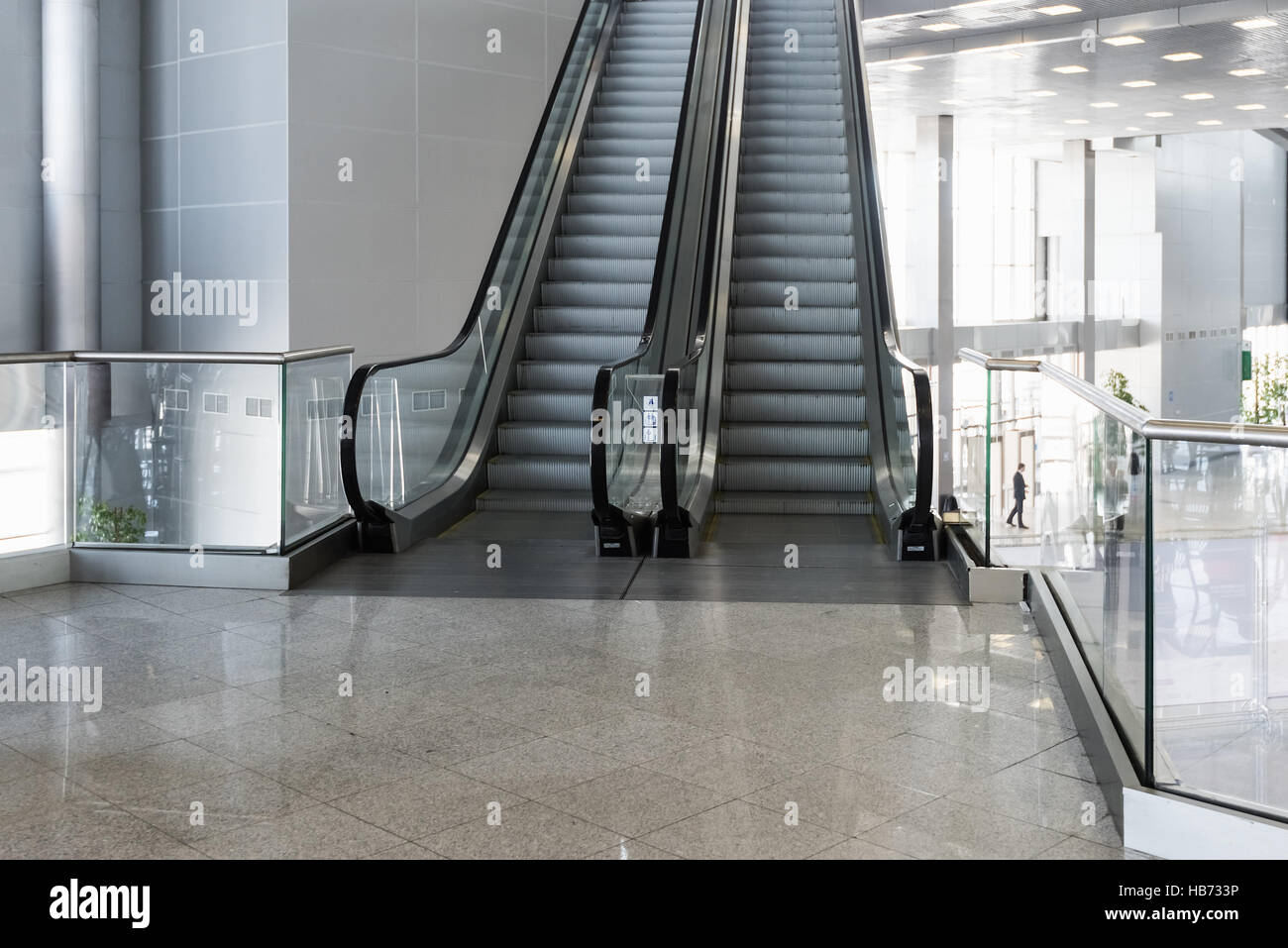 Escalator room with glass Stock Photo Alamy