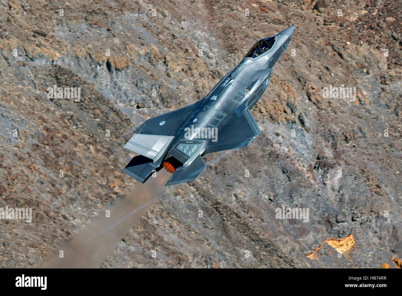Lockheed Martin F-35A Lighting II from the 323 Squadron, Royal Netherlands Air Force, flies low level through the Jedi Transition, Star Wars Canyon, Death Valley National Park, California, United States of America Stock Photo