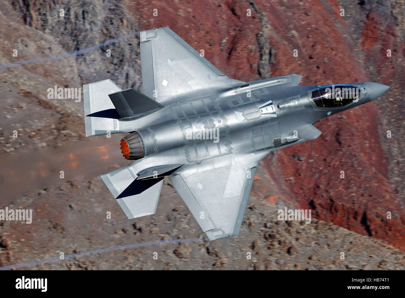 Lockheed Martin F-35A Lighting II from the 323 Squadron, Royal Netherlands Air Force, flies low level through the Jedi Transition, Star Wars Canyon, Death Valley National Park, California, United States of America Stock Photo